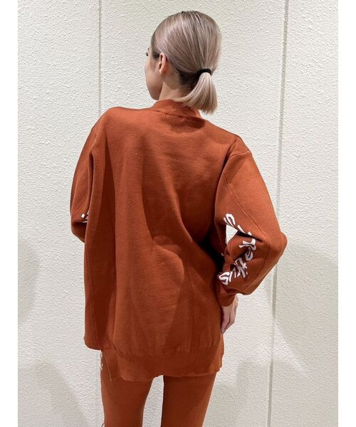 GYDA(ジェイダ)の「SZIMPATIKUSサイドスリットニットトップス(ニット/セーター・レディース・アイボリー/ブラック/ダークオレンジ・FREE)」の5枚目の写真