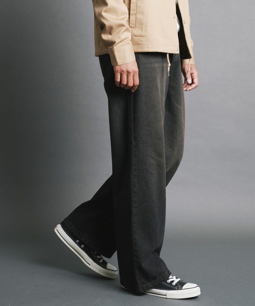COMMON WARE(コモンウェアー)の「COMMONWARE:10.5oz デニムオーバーダイ バギーパンツ(デニムパンツ・メンズ・ブラック/ブルー・M/L/XL)」の1枚目の写真