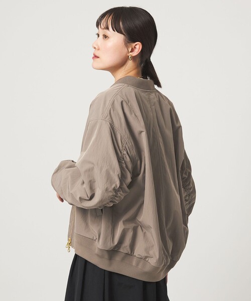 green label relaxing（グリーンレーベルリラクシング）の「コクーン MA-1（MA-1・レディース・モカ/ネイビー・38/36）」の8枚目の写真