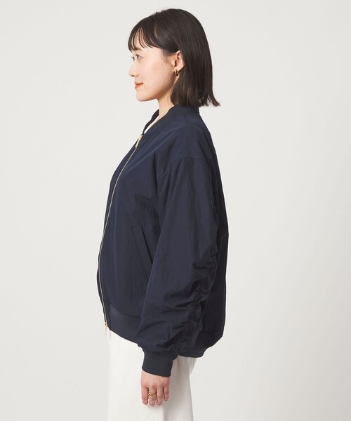 green label relaxing（グリーンレーベルリラクシング）の「コクーン MA-1（MA-1・レディース・モカ/ネイビー・38/36）」の13枚目の写真