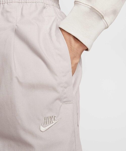 NIKE(ナイキ)の「ナイキ クラブ メンズ バルーン パンツ / Nike Club Men's Balloon Pants HJ1974-009 College Grey(チノパンツ・メンズ・グレー系その他2・L/M/S/2XL/XL)」の4枚目の写真