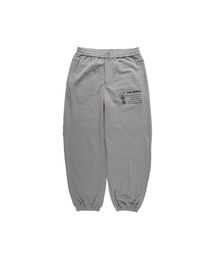 THEWARLD（ザワールド）の「FOOT PRINT LOGO SWEAT PANTS CHACOAL（スウェットパンツ）」