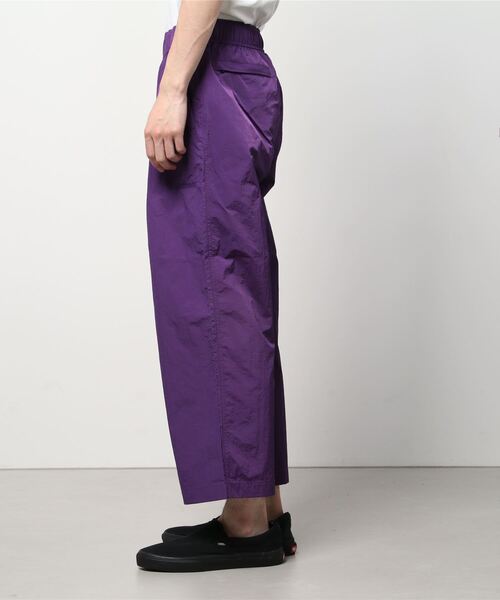 THOUSAND MILE(サウザンドマイル)の「THOUSAND MILE/別注 LIGHT SHELL WIDE PANTS(その他パンツ・メンズ・ブラック/パープル・L/S/M)」の3枚目の写真