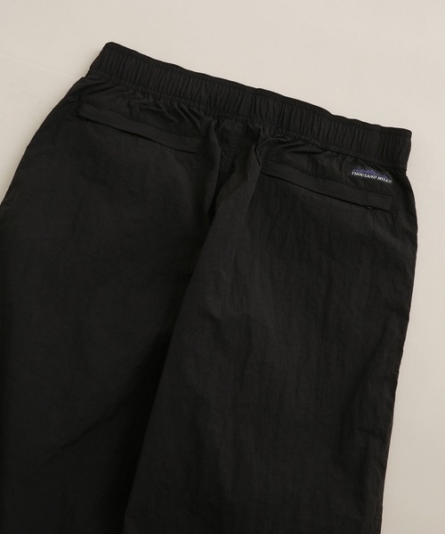 THOUSAND MILE(サウザンドマイル)の「THOUSAND MILE/別注 LIGHT SHELL WIDE PANTS(その他パンツ・メンズ・ブラック/パープル・L/S/M)」の13枚目の写真