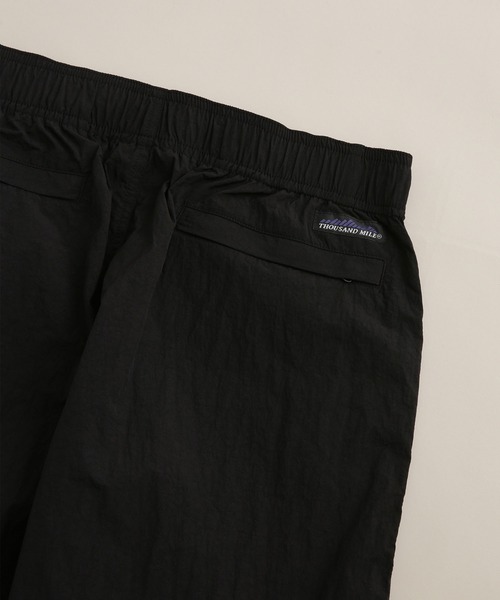 THOUSAND MILE(サウザンドマイル)の「THOUSAND MILE/別注 LIGHT SHELL WIDE PANTS(その他パンツ・メンズ・ブラック/パープル・L/S/M)」の14枚目の写真