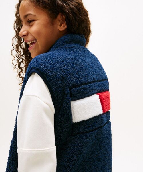 TOMMY HILFIGER（トミーヒルフィガー）の「KIDS リバーシブルテディナイロンベスト（ダウンベスト・キッズ・ネイビー・150cm/160cm/130cm/140cm）」の2枚目の写真
