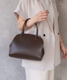 SHE HER HER HERS（シーハーハーハーズ）の「がまぐちボストンバッグ（ハンドバッグ）」