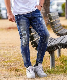 adamsJUGGLER（アダムスジャグラー）の「RTEG E's F ペイントデニムロングパンツ（デニムパンツ）」