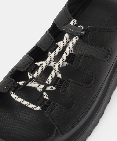 UGG(アグ)の「UGG W GOLDENGLOW TOGGLE 1179370-BLK(サンダル・レディース・ブラック・24cm/23cm/22cm/25cm)」の6枚目の写真