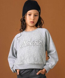 nexchic（ネクシック）の「サテンパッチレース裏毛トレーナー(110~150cm)（スウェット・キッズ）」