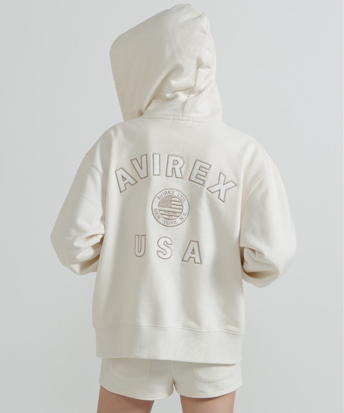 AVIREX(アヴィレックス)の「《直営店限定》VARSITY FLAG PARKA(パーカー・レディース・オフホワイト/ブラック・F)」の1枚目の写真