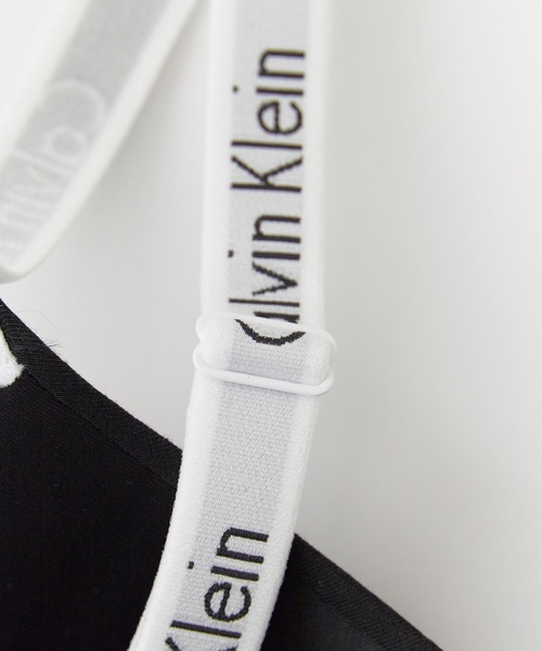 Calvin Klein（カルバン・クライン）の「Calvin Klein/カルバンクライン LGHTLY LINED BRALETTE ウエストロゴ パット付き ブラレット 2026年春夏（スポーツブラ・レディース・ブラック/グレー・S/M/L）」の6枚目の写真