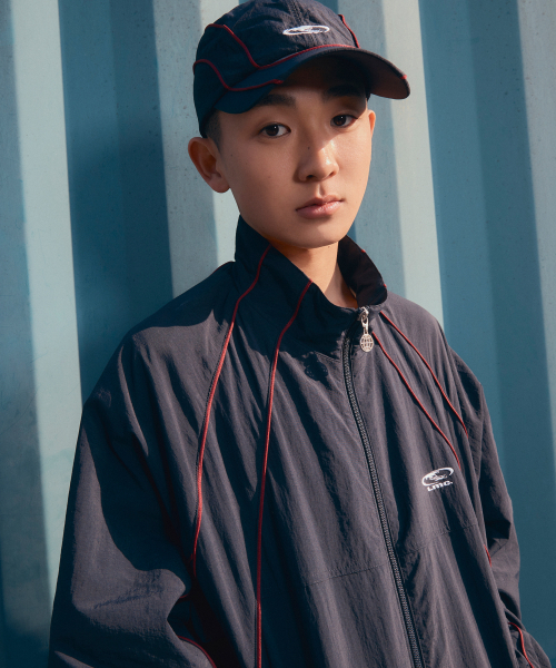 LMCの「PIPING TRACK JACKET navy(ナイロンジャケット・メンズ・その他・MEDIUM/LARGE/SMALL)」の2枚目の写真