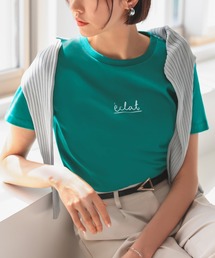 RUIRUE BOUTIQUE（ルイルエブティック）の「洗える ｜ 選べる2typeプリントTシャツ ｜ 半袖 クルーネック ラグラン トップス 体型カバー  オフィスカジュアル ロゴT 通勤服 華やか カットソー（Tシャツ/カットソー・レディース）」