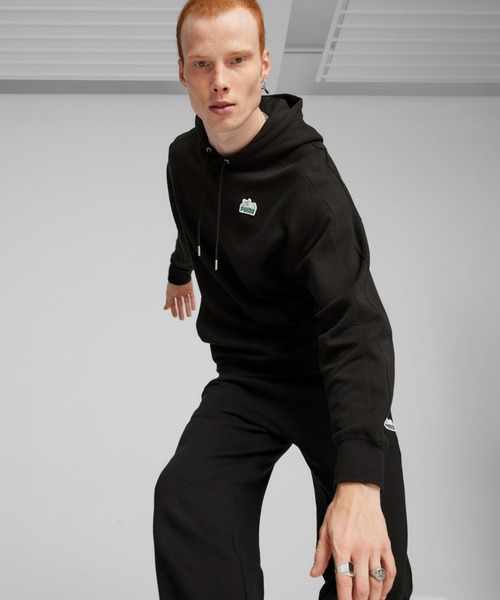 PUMA(プーマ)の「PUMA プーマ ユニセックス フォー ザ ファンベース T7 スーパー プーマ フー(パーカー・メンズ・イエロー系その他/ブラック・MEDIUM/SMALL/LARGE/X-LARGE/X-SMALL/XX-LARGE)」の1枚目の写真