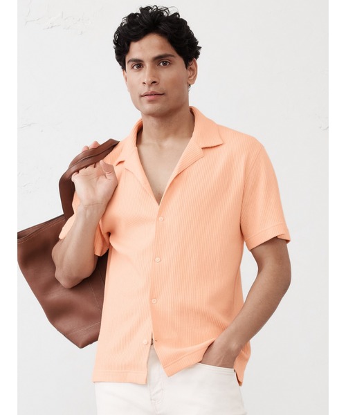BANANA REPUBLIC FACTORY STORE(バナナリパブリック ファクトリーストア)の「BANANA REPUBLIC FACTORY STORE クリンクルリブポロシャツ(シャツ/ブラウス・メンズ・オレンジ/アイボリー/ネイビー・S/M/L/XL)」の1枚目の写真