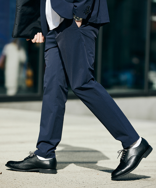 JOURNAL STANDARD(ジャーナルスタンダード)の「ナイロン 4WAY テーパード パンツ(スラックス・メンズ・ブラック/ネイビー・LARGE/SMALL/MEDIUM)」の2枚目の写真
