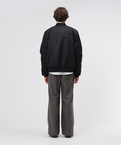 Alpha Industries(アルファインダストリーズ)の「Alpha Industries/アルファ インダストリーズ/MA-1 REGULAR FIT FLIGHT JACKET (NASA)/MA-1 レギュラーフィット フライトジャケット(MA-1・メンズ・ブラック/ネイビー・M/S/2XL/XL/L)」の6枚目の写真