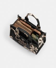 COACH（コーチ）の「カーゴ トート バッグ 20・ボウ プリント
