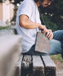 keu（ケウ）の「keu スキニーケース M(8.5inch)（ショルダーバッグ）」