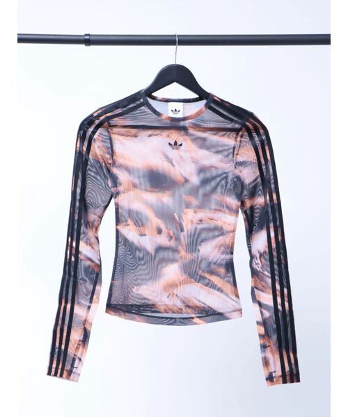 Now me. by NYLON JAPAN（ナウミーバイナイロンジャパン）の「【adidas】グラフィック メッシュ Tシャツ（Tシャツ/カットソー・レディース・オレンジ/グレー・SMALL/MEDIUM）」の2枚目の写真