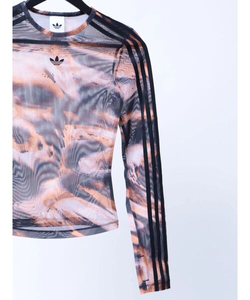 Now me. by NYLON JAPAN（ナウミーバイナイロンジャパン）の「【adidas】グラフィック メッシュ Tシャツ（Tシャツ/カットソー・レディース・オレンジ/グレー・SMALL/MEDIUM）」の7枚目の写真