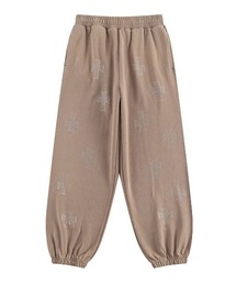 A'GEM9（エージェムナイン）の「A'GEM/9 × .kom 『UNKNOWN LONDON/アンノウン ロンドン』 Outline Cross Rhinestone Sweat Pants/アウトラインクロス ラインストーン スウェットパンツ（スウェットパンツ）」
