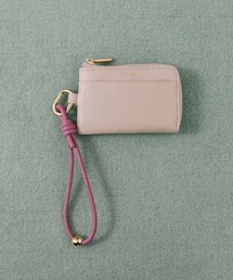 Beau're（ヴュレ）の「BEAURE カウレザー ハンドストラップ付き バイカラー フラグメント ケース（パスケース）」