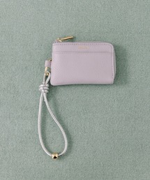 Beau're（ヴュレ）の「BEAURE カウレザー ハンドストラップ付き バイカラー フラグメント ケース（パスケース）」