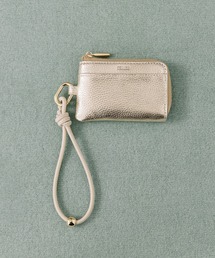 Beau're（ヴュレ）の「BEAURE カウレザー ハンドストラップ付き バイカラー フラグメント ケース（パスケース）」