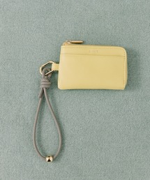 Beau're（ヴュレ）の「BEAURE カウレザー ハンドストラップ付き バイカラー フラグメント ケース（パスケース）」