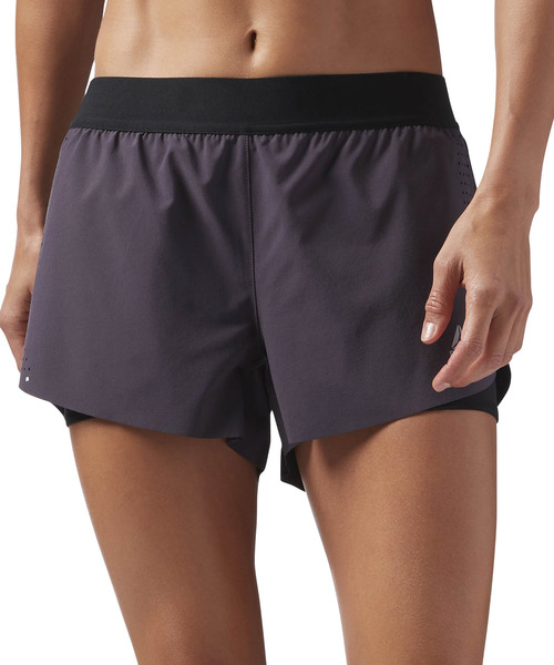 Reebok(リーボック)の「ワンシリーズ 2 in 1 ショーツ(その他パンツ・レディース・ブラック/パープル系その他・LARGE/MEDIUM/SMALL/X-LARGE)」の1枚目の写真