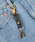 UNIVERSAL OVERALL�i���j�o�[�T���I�[�o�[�I�[���j�́u���v ���U�[ �L�[�t�b�N�i�L�[�z���_�[�j�v�b�u���b�N