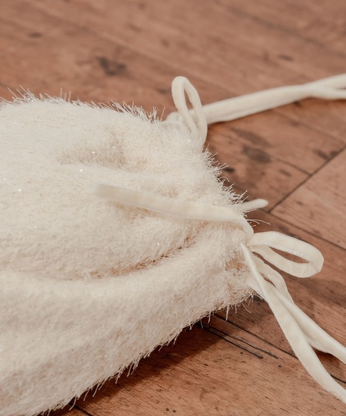 SMELLY（スメリー）の「フリンジリボンキンチャクバッグ（ショルダーバッグ・レディース・アイボリー/ブラック・-）」の5枚目の写真