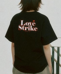 ROMANTIC CROWN（ロマンティッククラウン）の「A'GEM/9 × .kom 『ROMANTIC CROWN/ロマンティック クラウン』LOVE STRIKE T-SHIRT/ラブストライク半袖Tシャツ（Tシャツ/カットソー・メンズ）」
