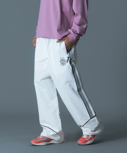 XLARGE（エクストララージ）の「NYLON TRACK PANTS（その他パンツ・メンズ・ブラック/ホワイト/ネイビー・XL/L/M/S）」の2枚目の写真