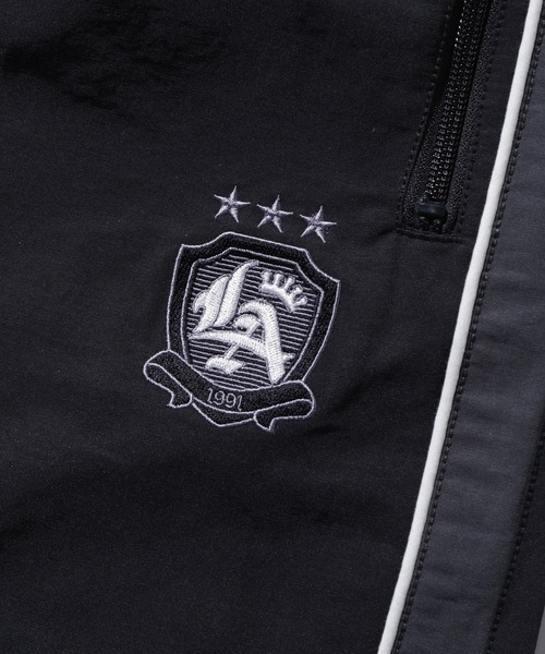 XLARGE（エクストララージ）の「NYLON TRACK PANTS（その他パンツ・メンズ・ブラック/ホワイト/ネイビー・XL/L/M/S）」の6枚目の写真