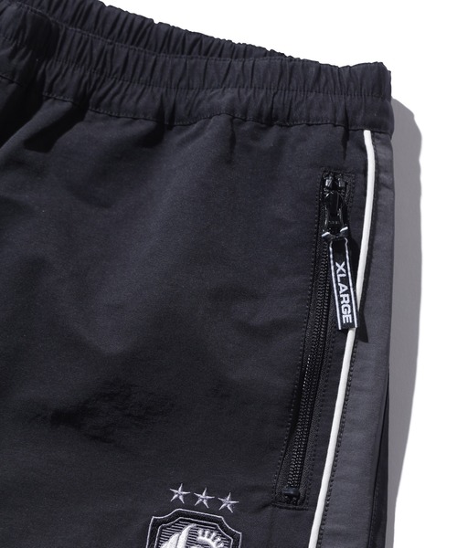 XLARGE（エクストララージ）の「NYLON TRACK PANTS（その他パンツ・メンズ・ブラック/ホワイト/ネイビー・XL/L/M/S）」の7枚目の写真