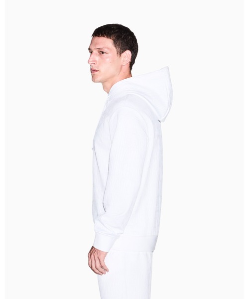 ARMANI EXCHANGE(アルマーニエクスチェンジ)の「【A|X アルマーニ エクスチェンジ】オールオーバーロゴ フーデッドスウェットプルオーバー(EC限定カラー含)(スウェット・メンズ・オフホワイト・LARGE/MEDIUM/SMALL/X-LARGE/X-SMALL)」の9枚目の写真
