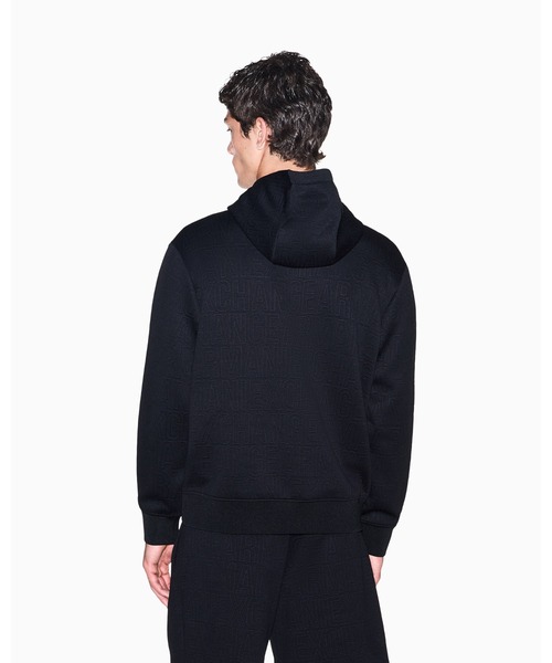 ARMANI EXCHANGE(アルマーニエクスチェンジ)の「【A|X アルマーニ エクスチェンジ】オールオーバーロゴ フーデッドスウェットプルオーバー(EC限定カラー含)(スウェット・メンズ・オフホワイト・LARGE/MEDIUM/SMALL/X-LARGE/X-SMALL)」の3枚目の写真