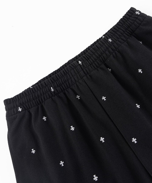 UNKNOWN LONDON(アンノウン・ロンドン)の「A'GEM/9 × .kom 『UNKNOWN LONDON/アンノウン ロンドン』 Tiny Cross Glitter Sweat Pants/タイクロス グリッター スウェットパンツ(スウェットパンツ・メンズ・オフホワイト/ブラック・S/M)」の6枚目の写真