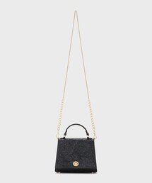 CARVING TRIBES（カービングトライブス）の「Metal clasp bag