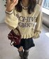 CIAOPANIC（チャオパニック）の「シャギー配色ロゴフリルニットカーディガン（ニット/セーター・ONE SIZE）」