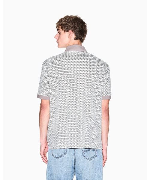 ARMANI EXCHANGE(アルマーニエクスチェンジ)の「【A|X アルマーニ エクスチェンジ】オールオーバーロゴ 半袖ポロシャツ/REGULAR(ポロシャツ・メンズ・アイボリー・LARGE/SMALL/X-LARGE/X-SMALL/MEDIUM/XX-LARGE)」の2枚目の写真