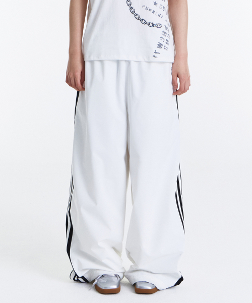 KICHUL(キチョル)の「Layer Side Line Track Pants (White)(その他パンツ・メンズ・その他・SMALL/MEDIUM/LARGE)」の2枚目の写真