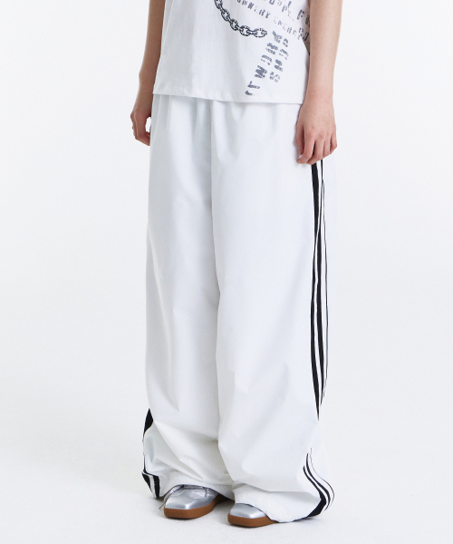 KICHUL(キチョル)の「Layer Side Line Track Pants (White)(その他パンツ・メンズ・その他・SMALL/MEDIUM/LARGE)」の3枚目の写真