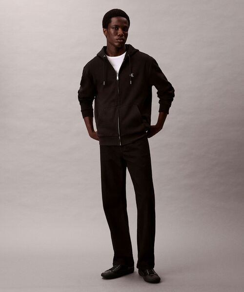 Calvin Klein(カルバン・クライン)の「ロングスリーブ アーカイブロゴ フリースジップパーカー(パーカー・メンズ・ネイビー/グレー/ブラック・S/L/M/XL)」の4枚目の写真