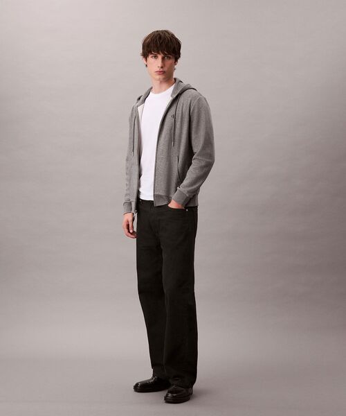 Calvin Klein(カルバン・クライン)の「ロングスリーブ アーカイブロゴ フリースジップパーカー(パーカー・メンズ・ネイビー/グレー/ブラック・S/L/M/XL)」の11枚目の写真