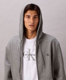 Calvin Klein（カルバン・クライン）の「【ユニセックス】 ロングスリーブ アーカイブロゴ フリースジップパーカー（パーカー）」