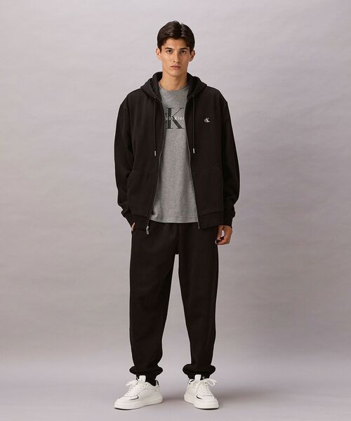 Calvin Klein(カルバン・クライン)の「ロングスリーブ アーカイブロゴ フリースジップパーカー(パーカー・メンズ・ネイビー/グレー/ブラック・S/L/M/XL)」の22枚目の写真